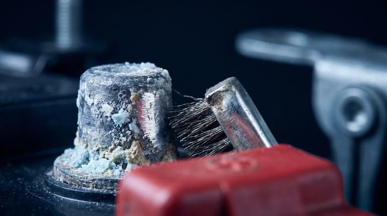 Corrosion built up on a car battery terminal